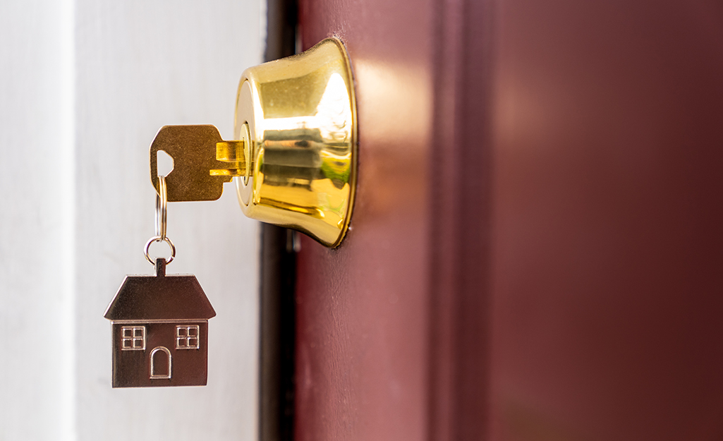 Burgundy Door with key in the lock